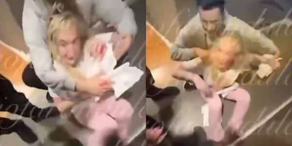 Fran Maira sentada en el suelo y con el rostro ensangrentado después de una agresión