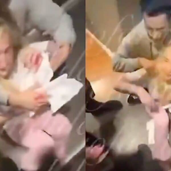 Fran Maira sentada en el suelo y con el rostro ensangrentado después de una agresión