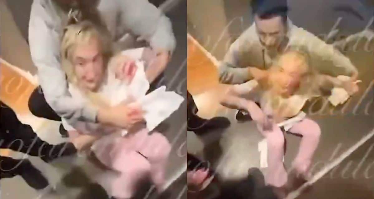 Fran Maira sentada en el suelo y con el rostro ensangrentado después de una agresión