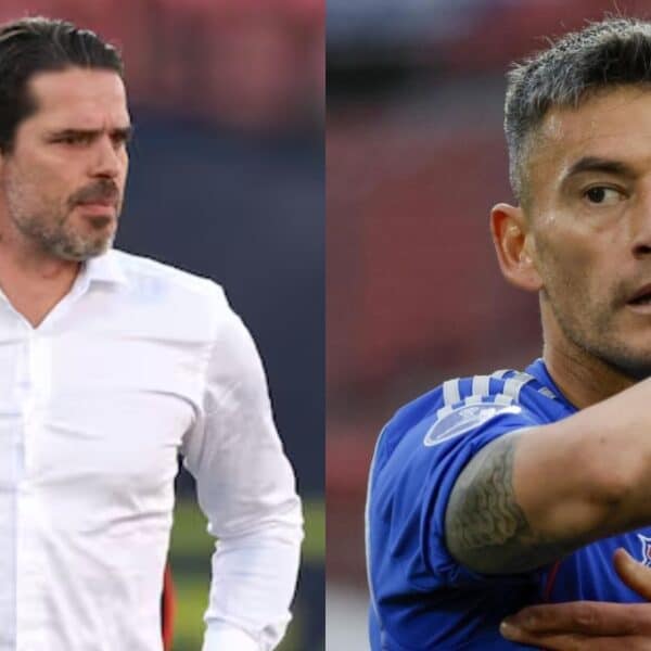 Charles Aránguiz en tenso cruce con Fernando Gago durante el Superclásico