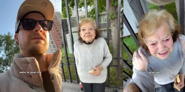 Ariel Osses durante un emotivo encuentro con una adulta mayor en la comuna de Macul, en Santiago.